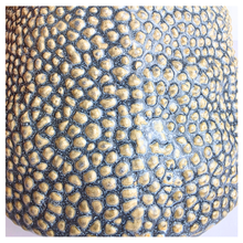 Load image into Gallery viewer, Textured ceramic pot labeled &#39;Nubo&#39; with LEAFERIE branding on a light 
