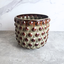 Load image into Gallery viewer, Twilla Ceramic pot with textured surface on a gray surface
