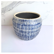 Load image into Gallery viewer, Hira Blue and white textured vase on a marble surface with 'LEAFERIE' 
