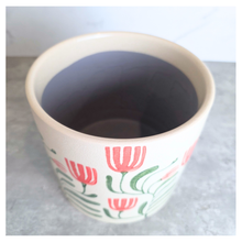 Load image into Gallery viewer, Emmett Decorative pot with floral design on a marble surface, featuring the brand 'LEAVERIE'.
