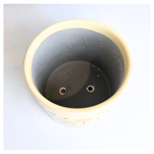 Load image into Gallery viewer, Tierra Decorative pot with floral design on a marble background, featuring the brand 'LEAFERIE'.
