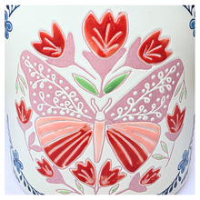 Load image into Gallery viewer, Bloomie Ceramic pot with floral and butterfly design on a marble background, featuring the brand &#39;LEAFERIE&#39;.
