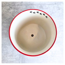 Load image into Gallery viewer, Nilo Ceramic pot with chicken design on a marble background, featuring the brand 'LEAFERIE'.
