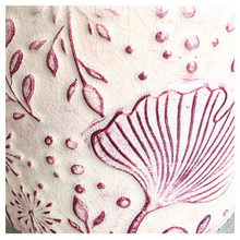 Load image into Gallery viewer, Dalia Ceramic planter with floral pattern on a marble surface, featuring the brand 'LEAFERIE'.
