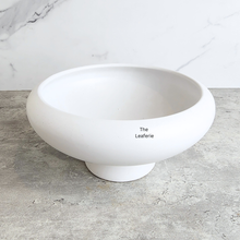 Load image into Gallery viewer, Xara ceramic flowerpot in white, black, and green with Leaferie branding.
