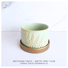 Load image into Gallery viewer, Mirela Decorative ceramic pot with leaf patterns on a white background, featuring the brand &#39;LEAFERIE&#39;.
