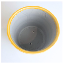 Load image into Gallery viewer, Marigold Yellow ceramic pot with leaf pattern on a marble background, featuring the Leaferie brand.
