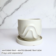 Load image into Gallery viewer, The Leaferie Tymo white pot. wavy design and ceramic material
