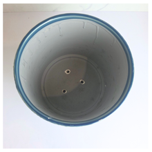 Load image into Gallery viewer, Sapphire Blue patterned candle container with 'LEAFAERIE' branding on a marble background
