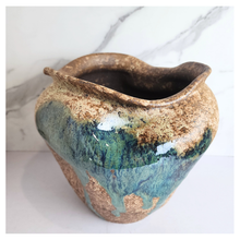 Load image into Gallery viewer, Raku ceramic vase with gold and blue glaze on a white background, featuring the Leaferie brand.
