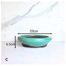 Load image into Gallery viewer, The Leaferie Bonsai 99. round green ceramic pot
