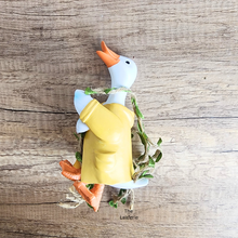 Load image into Gallery viewer, Pip Hanging Decoration .Two decorative items, a yellow mouse and a yellow duck, on a swing with &#39;LEAFERIE&#39; branding.
