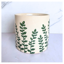 Load image into Gallery viewer, Verdin Two ceramic planters with green leaf patterns on a light blue background, featuring the brand 'LEAFERIE'.
