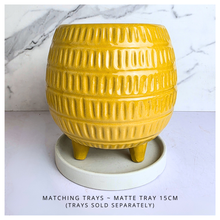 Load image into Gallery viewer, Daisy Yellow textured ceramic pot with 'LEAFERIE' branding on a marble background
