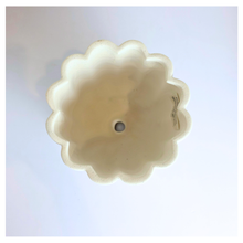 Load image into Gallery viewer, Ripple White ceramic planter with wavy texture on a marble background, featuring the Leaferie brand.
