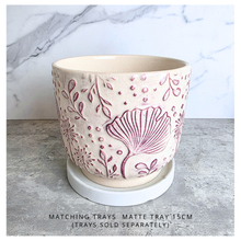 Load image into Gallery viewer, Dalia Ceramic planter with floral pattern on a marble surface, featuring the brand 'LEAFERIE'.
