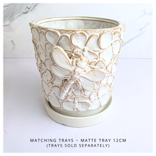 Load image into Gallery viewer, Handmade Elio Decorative ceramic pot with dragonfly design on a marble background, featuring the brand 'LEAFERIE'.
