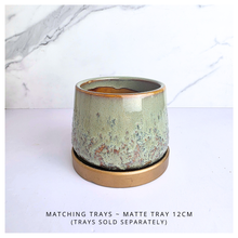 Load image into Gallery viewer, Tero Green ceramic cup with speckled texture on a white background, featuring the LEAFAERIE brand.
