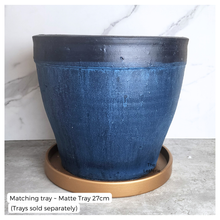 Load image into Gallery viewer, Blue ceramic pot with matching brown tray on a marble surface
