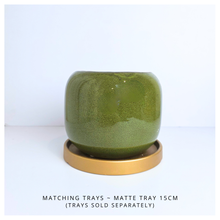 Load image into Gallery viewer, Soraya ceramic pots, one red and one green, with &#39;LEAFERIE&#39; branding on a white background.
