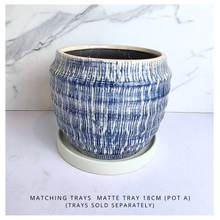 Load image into Gallery viewer, Hira Blue and white textured vase on a marble surface with 'LEAFERIE' 
