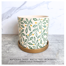 Load image into Gallery viewer, Aurelia Decorative pot with leaf pattern on a marble surface, featuring the brand 'LEAFAERIE'.

