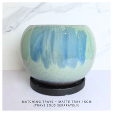 Load image into Gallery viewer, Ares Two green ceramic pots on a white marble surface with 'LEAFAERIE' branding.
