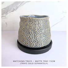 Load image into Gallery viewer, Textured ceramic pot labeled &#39;Nubo&#39; with LEAFERIE branding on a light 
