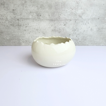 Load image into Gallery viewer, The Leaferie Maja Egg flowerpot. cream white ceramic pot. front view of designs B

