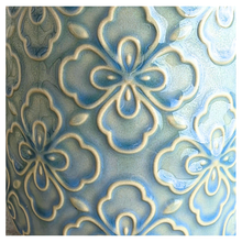 Load image into Gallery viewer, Tory Two ceramic pots with floral patterns on a marble surface, featuring the Leaferie brand.
