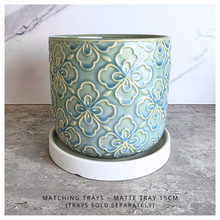 Load image into Gallery viewer, Tory Two ceramic pots with floral patterns on a marble surface, featuring the Leaferie brand.
