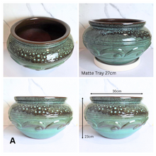 Load image into Gallery viewer, Avira by Leaperie, featuring a textured, ribbed glaze that transitions from a dark brown at the top to a vibrant teal-green at the base. The pot is shown from the front, side, and bottom angles against a white marble background.
