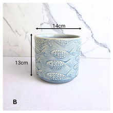 Load image into Gallery viewer, Lumera with fish pattern flowerpot on a white background, featuring the brand 'LEAFERIE'.
