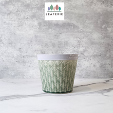Load image into Gallery viewer, The Leaferie Emilia Plant pot . green ceramic . front view
