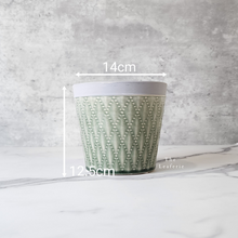 Load image into Gallery viewer, The Leaferie Emilia Plant pot . green ceramic . front view . measurement
