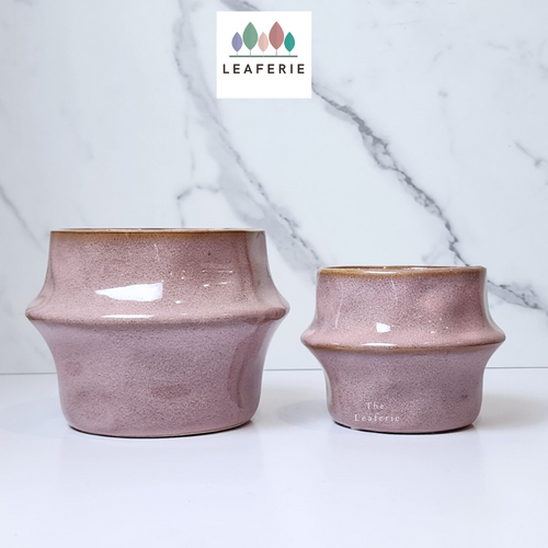 The Leaferie Harsha pink pot 2 sizes made of ceramic. front view of the 2 pots