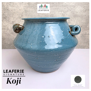 Koji Leafeire signature Blue ceramic pot with handles. Ceramic material