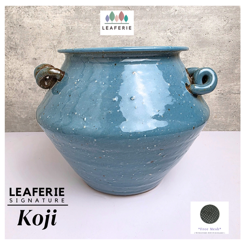 Koji Leafeire signature Blue ceramic pot with handles. Ceramic material