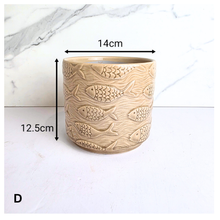 Load image into Gallery viewer, Lumera with fish pattern flowerpot on a white background, featuring the brand 'LEAFERIE'.
