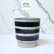 Load image into Gallery viewer, The Leaferie Makoto plant pot. blue stripes ceramic planter . Front view
