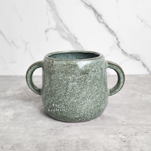 Load image into Gallery viewer, The Leaferie Naoki green plant pot with 2 handles. ceramic material. front view 
