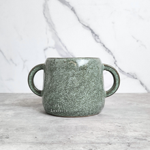 Load image into Gallery viewer, The Leaferie Naoki green plant pot with 2 handles. ceramic material. front view close up
