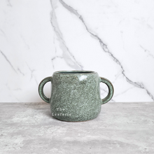 Load image into Gallery viewer, The Leaferie Naoki green plant pot with 2 handles. ceramic material. front view 
