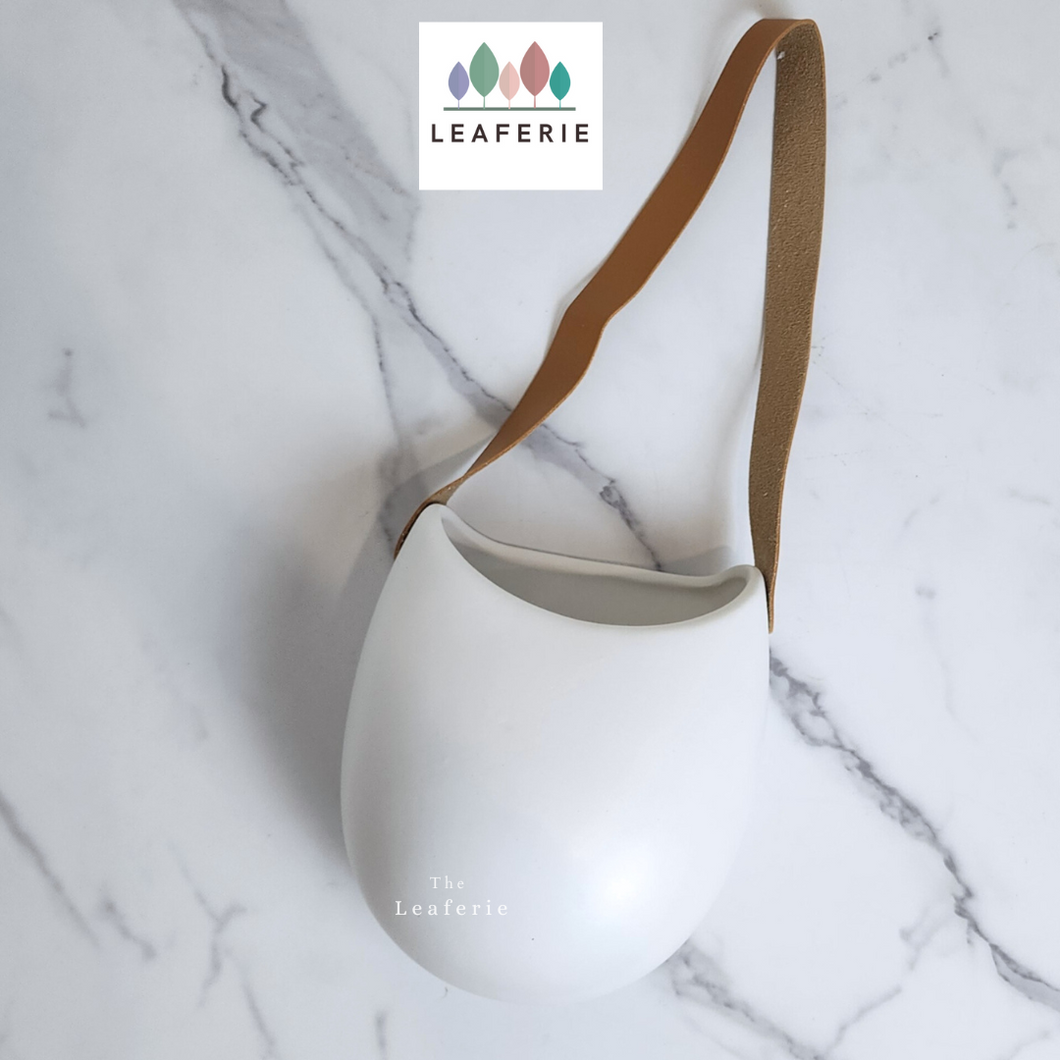 The Leaferie Pari wall hanging plant pot. white colour without drainage hole