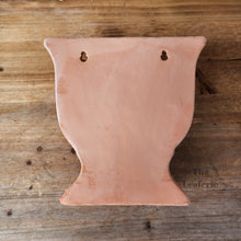 Load image into Gallery viewer, The Leaferie croia terracotta wall hanging planter. back view
