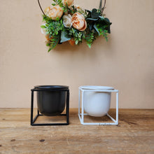 Load image into Gallery viewer, The Leaferie Rainier Plant pot. 2 colours black and white. Metal and ceramic material
