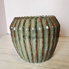 Load image into Gallery viewer, The Leaferie Brise plant pot . green ceramic pot . front view. close up
