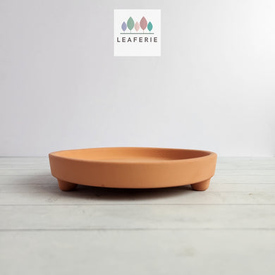 The Leaferie Terracotta round trays with stand . 3 sizes.  Front view