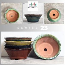 Load image into Gallery viewer, The Leaferie Bonsai planter series 23 . rounc zisha trays with 5 colours. front view
