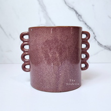 Load image into Gallery viewer, The Leaferie Juro red planter with many handles. ceramic material front view of pot
